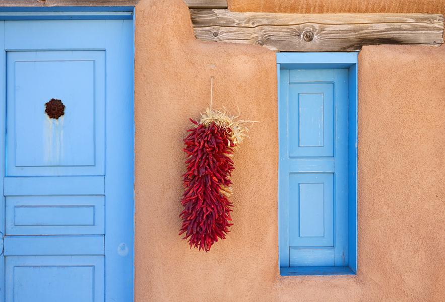 chili peppers on adobe structure santa fe