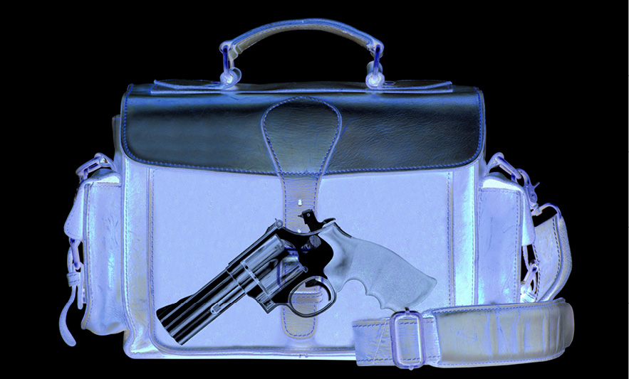 xray of handgun in carry on bag